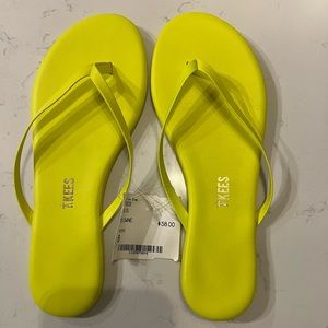 Super cute TKEES flip flops! Soft leather and vibrant yellow color w/ dust bag.